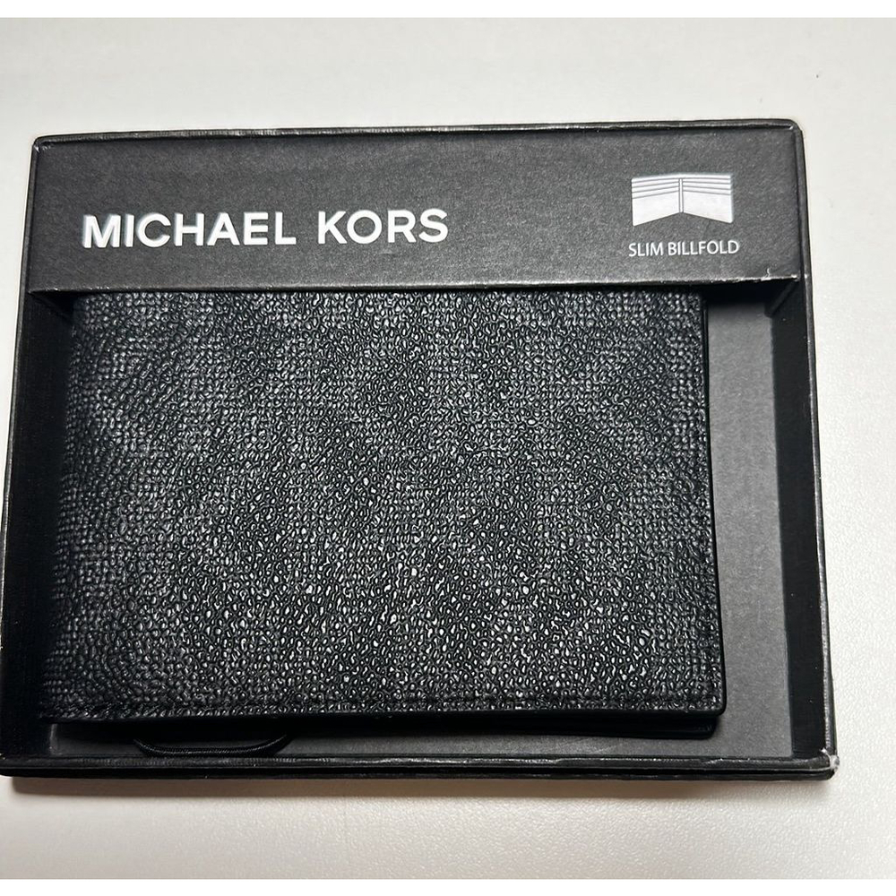 Michael Kors Wallet, slim billfold. Mk logo black and gray